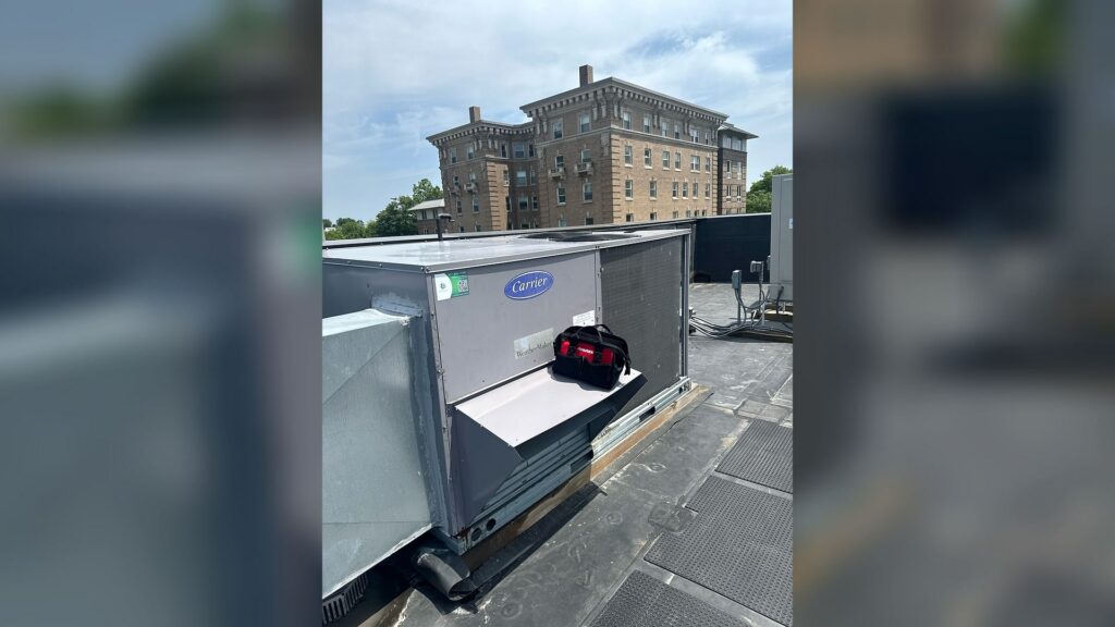 Carrier rooftop HVAC unit PM and repair support at a Newton plastic surgery center.