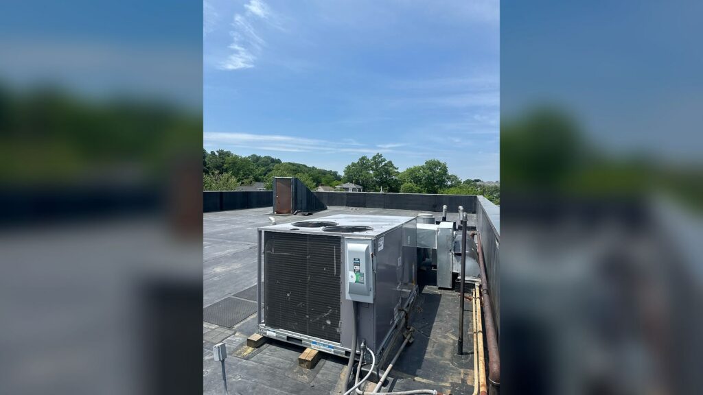 Commercial rooftop HVAC unit maintained at a Newton medical office building.