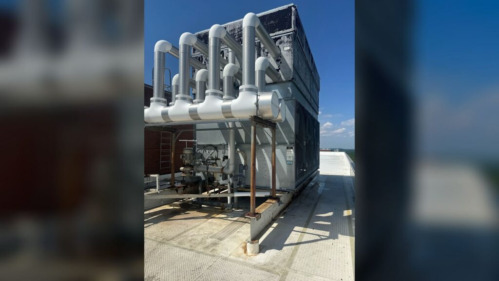 Rooftop data center HVAC equipment and piping in Waltham, MA.